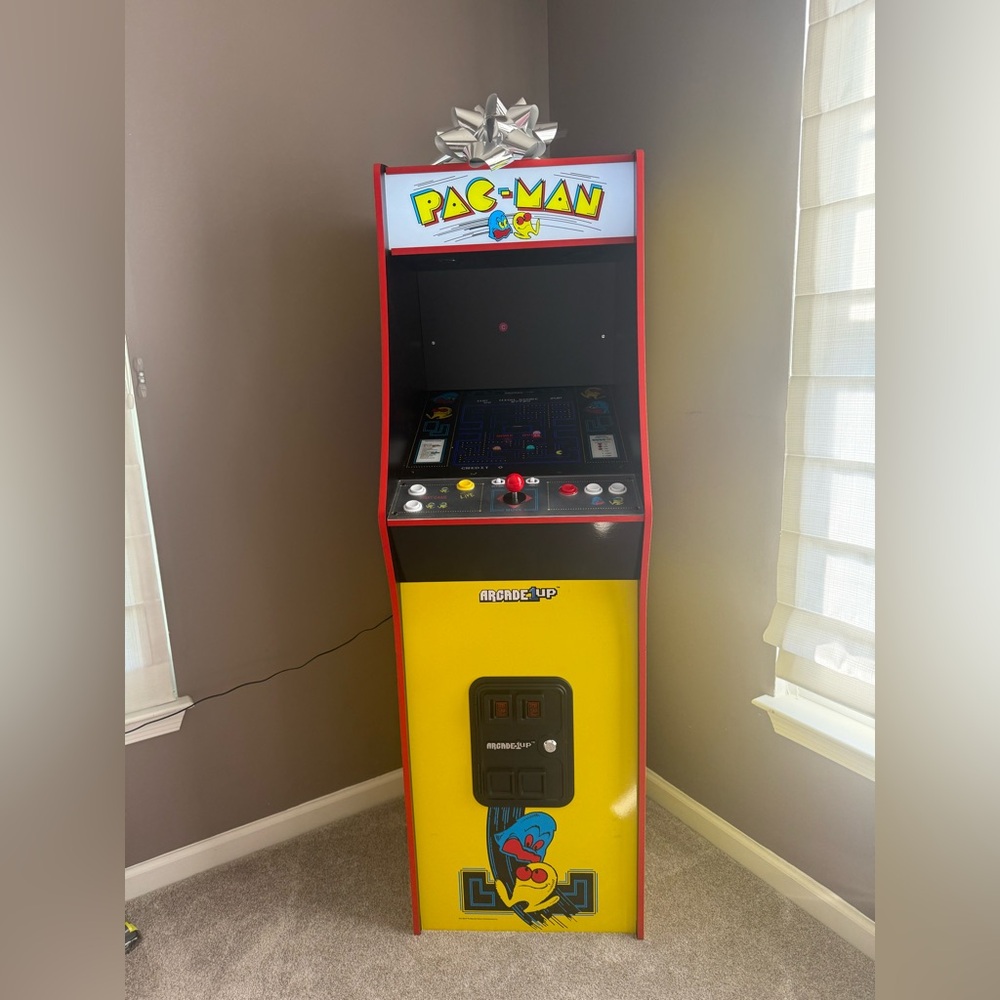Ms Pac-Man machine with multiple games and brand new stool. Plug in.